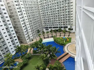 an aerial view of a resort with tall buildings at Affordable Condotel Stay in Pasay, MOA Complex in Sampong