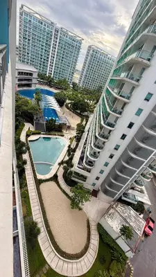 an aerial view of a large building with a pool at Azure Urban Resort 1BR-2BR Boracay in Manila