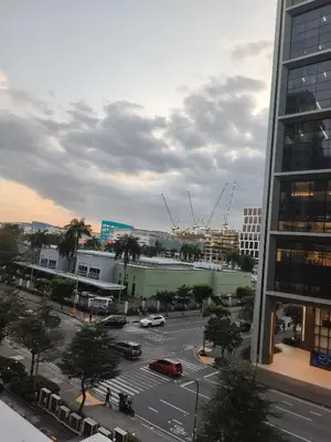 a view of a city with cars on a street at Shore Recidences Mall Of Asia Cullen in Manila