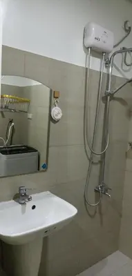 a bathroom with a sink and a shower at SM Mall of Asia Shore2 Tower2 Nano Nap&Go in Manila