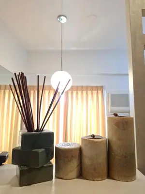 a room with three vases sitting on a table at Cozy Hotel-Style Studio Unit for Rent at Eastbay Residences by Rockwell in Manila