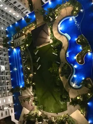 an aerial view of a river in the middle of a building at Shore residence A42 shortwalk mall of asia in Manila