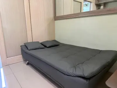 a bed with two pillows on it in a room at 1BR Staycation at JAZZ Makati 29F 65 Smart TV in Manila