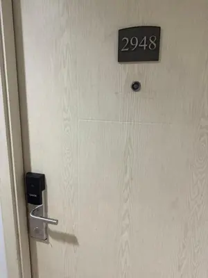 a door with a speed limit sign on it at 1BR Staycation at JAZZ Makati 29F 65 Smart TV in Manila