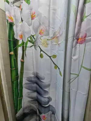 a shower curtain with a flower on it with a snake at ZEN 2 SHORE RESIDENCES Tower A in Manila