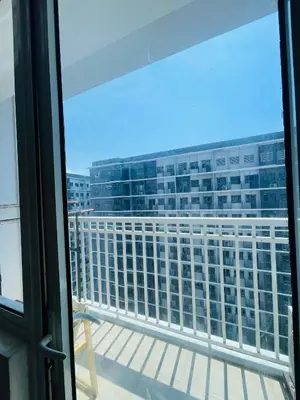 a view from the balcony of a building at Casa California by AC Haven in Shore Residences near MOA Pasay City in Manila
