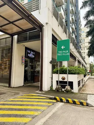 a two million tree walks sign in front of a building at Kai cabins NEAR NAIA 3 SELF CHECK IN AT NEWPORT CITY in Manila