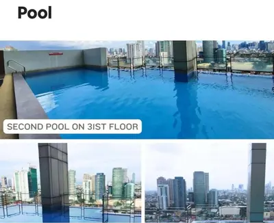 a pool on the top of a building at Luxury 2BR Condo in Makati Near Malls & Offices in Manila
