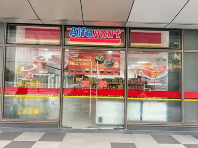 a store front of a restaurant with glass doors at Vera's Place in Mall of Asia Complex in Manila