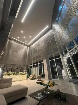 a living room with a couch and a table at NestAway Condo in Manila