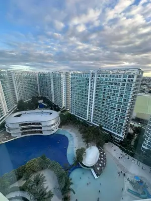 an aerial view of a large city with tall buildings at penthouse condo in Azure - near airport in Manila