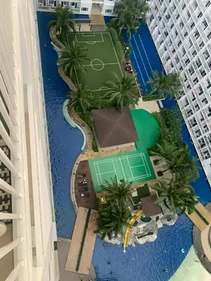 an aerial view of a resort with a tennis court at Shore Residence by Buhay Staycation in Manila