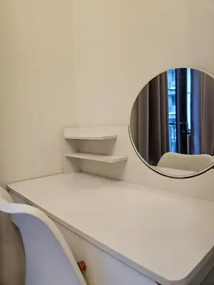 a mirror sitting on top of a white table at Shore 2 Tower 2 Pool View 1BR near MOA and NAIA Shore003 in Manila