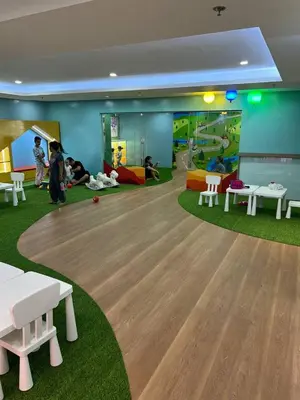 a childrens play room with a table and chairs at Great View at Pioneer Mandaluyong Free Pool Gym Netflix Fast Wifi in Manila