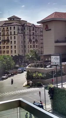 a view of a city street with a large building at 3N Palm Tree Villas in Manila