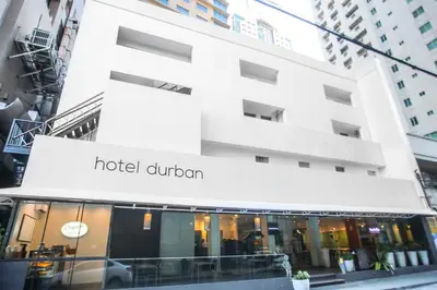 a hotel union building on a city street at Hotel Durban in Manila