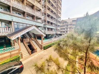 an overhead view of a building with a car parked in front at SweetSuites at Pine Crest #T3-1212 in Manila