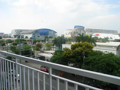 a view of a city from a balcony at Salem's Abode in Manila