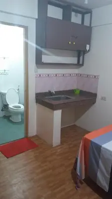 a bathroom with a sink and a toilet at Budget Studio Unit in Makati in Manila