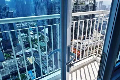 a view of a city from a window in a building at Light Residences 1BR Apartment Balcony in Manila