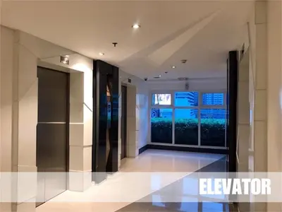 a hallway with a large window in a building at SMDC Light Residences Condominium in Manila