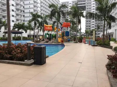 a playground in the middle of a pool in a city at BEST Q CONDO w/ Great View in Manila
