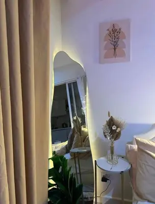 a living room with a curtain and a table at AZURE URBAN RESIDENCES- Beach View in Manila