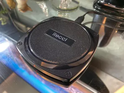 a black speaker sitting on top of a stove at Your HOME @ Princeton Residences, New Manila in Manila