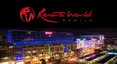 a view of a city at night with the words north world manila at One Palm Tree Villas in Manila
