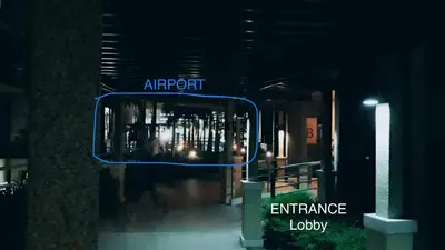 an entrance to an entrance lobby at night at Palm Tree Villas 1 in Manila