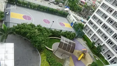 an overhead view of a basketball court on a building at Cozy 1BR-Grace Residences in Manila