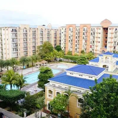 1BR with Balcony Overlooking Pool Chateau Elysee Near NAIA