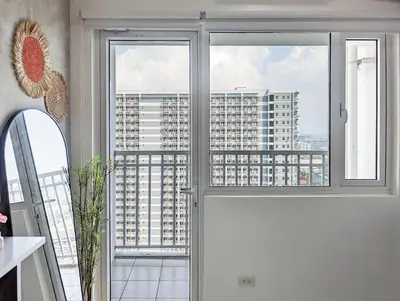 a view of a building from a window at Studio Condo Manila by the Bay Roxas Blvd near US Embassy in Manila