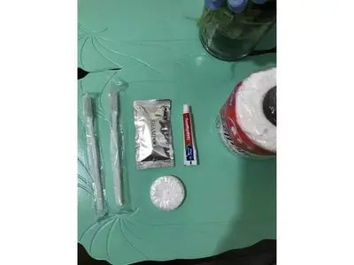a table with several different metals on it at Shanilyn Residency Urban Deca Towers EDSA Mandaluyong,UNLIMITED INTERNET AND NETFLIX in Manila
