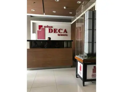 a lobby with a sign that reads when decca towers at Shanilyn Residency Urban Deca Towers EDSA Mandaluyong,UNLIMITED INTERNET AND NETFLIX in Manila