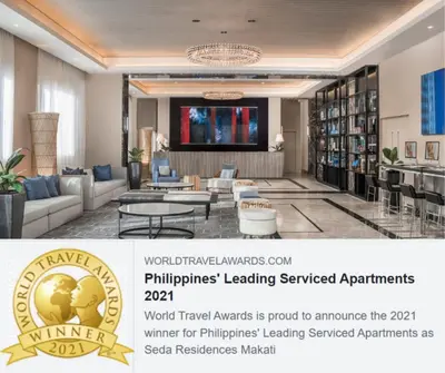 a rendering of a hotel lobby with a library at Seda Residences Makati in Manila