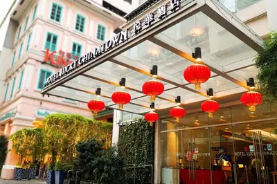 a group of red lanterns hanging from a store front at Hotel Lucky Chinatown Binondo Manila in Manila