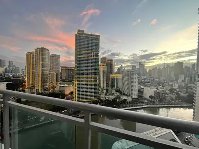 a view of a city skyline with tall buildings at Great 1BR Aqua Livingstone with Netflix, Pool & Gym in Manila