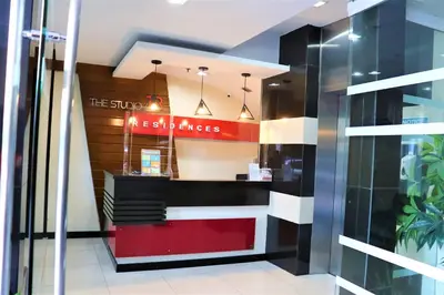 a restaurant with a sign that reads the store ambassadors at The Studio 18 Residences in Manila