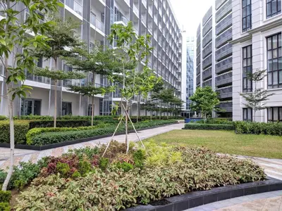 a garden in the middle of a building at Studio Condo NAIA Airport Terminal 3 Newport City Casino in Manila