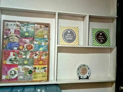 a display cabinet filled with different types of food at Mia and Miguel's House in General Trias