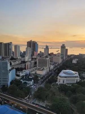 an aerial view of a city at sunset at Juja's place in Manila