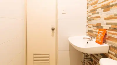 a bathroom with a sink and a shower at RedDoorz near Quiapo Church Manila in Manila