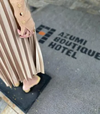 a person standing on a skateboard on a street at Azumi Boutique Hotel in Manila