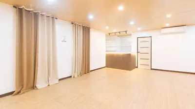 an empty room with curtains and a whiteboard at RedDoorz at RJs Bldg near Lyceum Gen Trias Cavite Cion Suites in General Trias