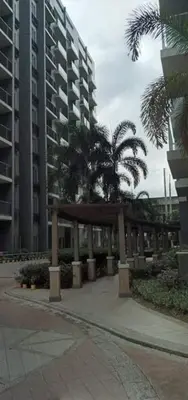 a pavilion in front of a large building at One Palm Tree Villas NAIA TERMINAL 3 in Manila