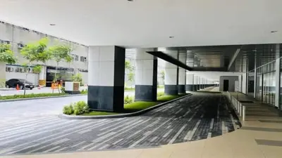 a large building with a lot of columns at Adel's Cosy Place - SMDC Shore 2 Philippines in Manila