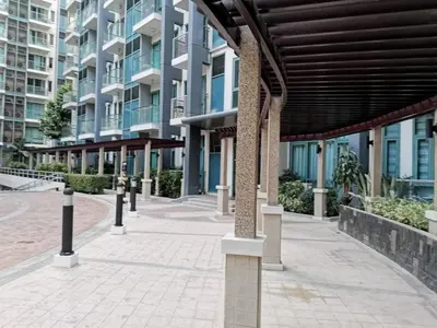 a building with a walkway in front of a building at palm tree villas in Manila