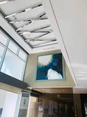 a large painting on the ceiling of a building at Sea Residences - Tino Val in Manila