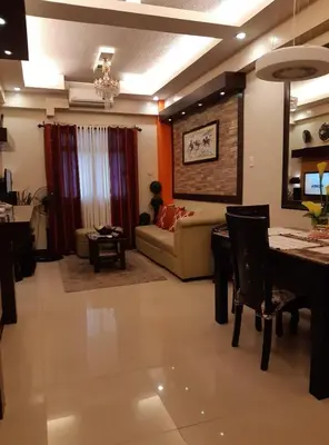a living room with a couch and a table at Sarasota Residential Resort cluster 4 Unit 6B and 6C by Manny Newport Blvd, across NAIA T3 & near Resorts World Manila, Pasay City in Manila